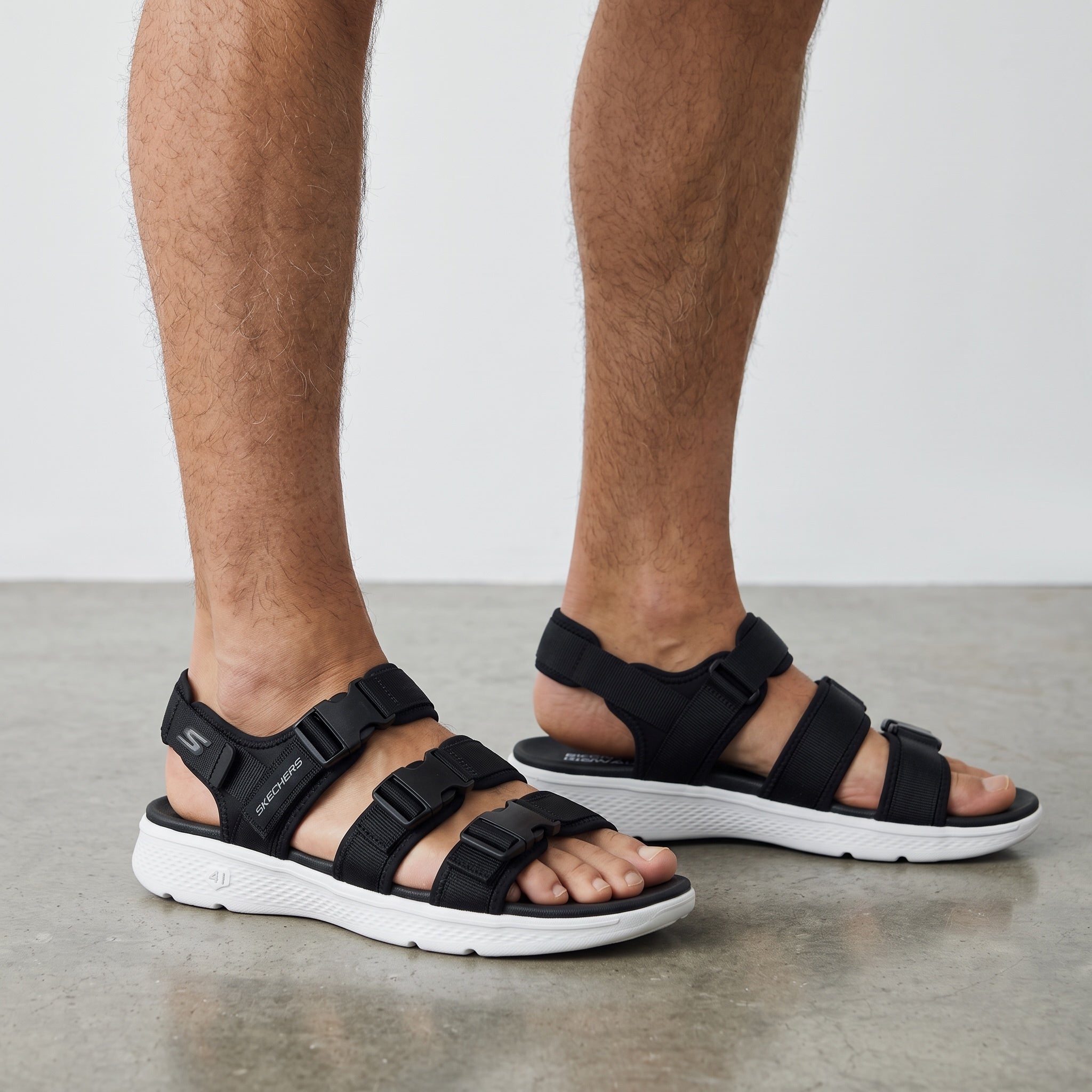 Black Skechers men's sport strap sandals with white sole