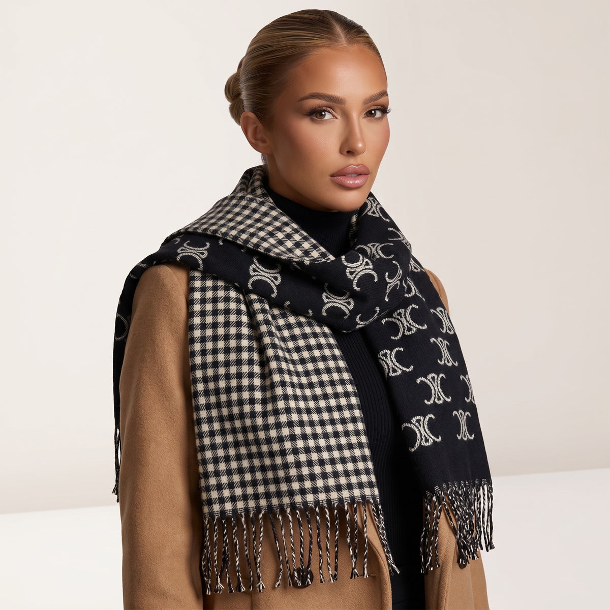 Black Celine scarf with repeating Triomphe logo and check reverse, fringed ends