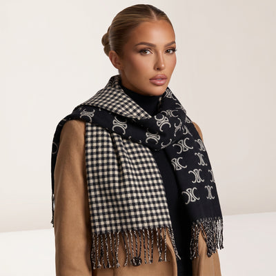 Black Celine scarf with repeating Triomphe logo and check reverse, fringed ends