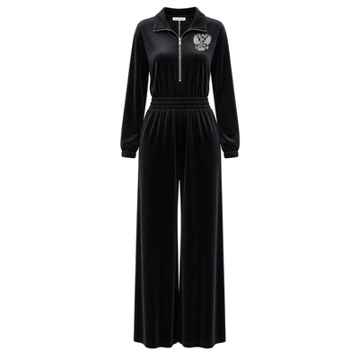black velvet jumpsuit with half zip, elastic waist and embroidered crest on chest and back