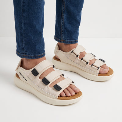 Cream Skechers platform sandal with three adjustable straps and tan footbed
