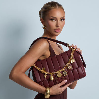 burgundy quilted Fendi shoulder bag with gold charm chain