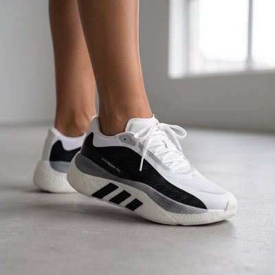 Adidas Superboost 700 white and black sneakers with thick cushioned midsole