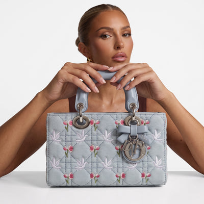 Light blue Dior Lady Dior top-handle bag with floral and dove embroidery and silver charms