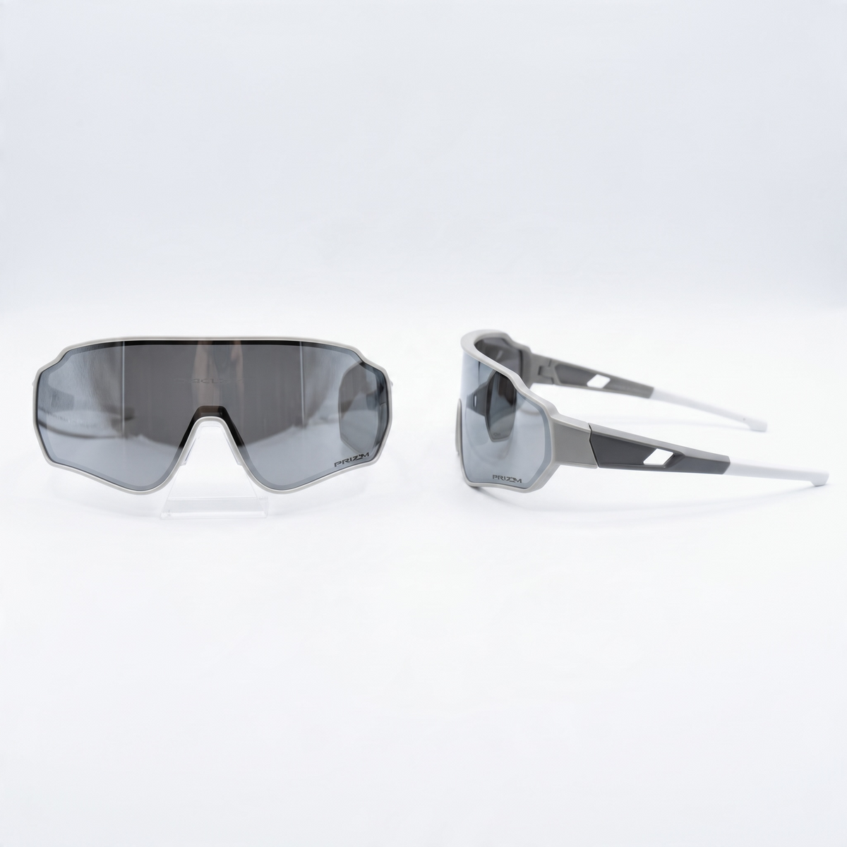 Oakley shield sunglasses with grey Prizm one-piece lens and grey frame