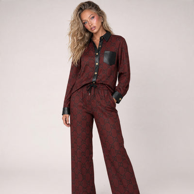 Gucci burgundy GG printed shirt with black trim and matching drawstring trousers set