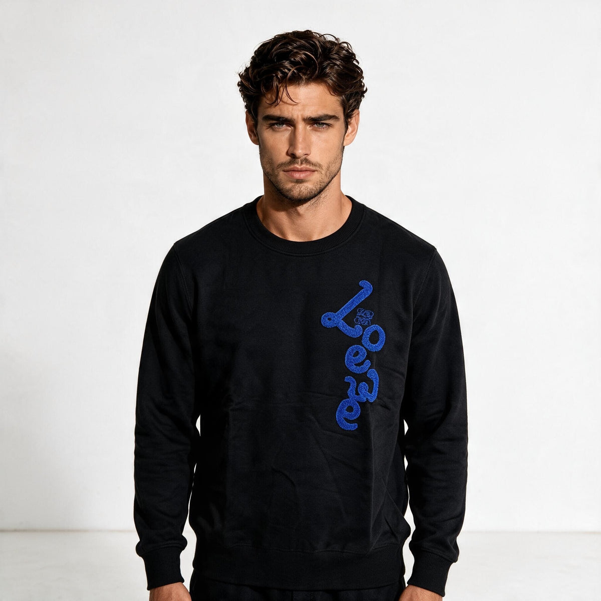 Black Loewe crewneck sweatshirt with blue vertical logo on right side