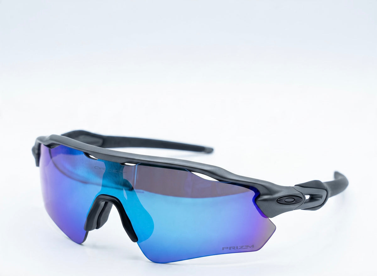 Oakley shield sunglasses with matte black frame and blue prizm mirrored shield lens