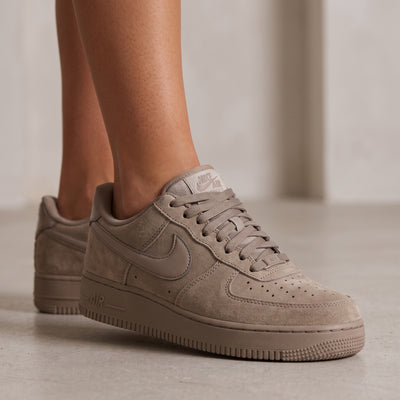 Taupe Nike Air Force 1 low-top sneaker with suede-look panels