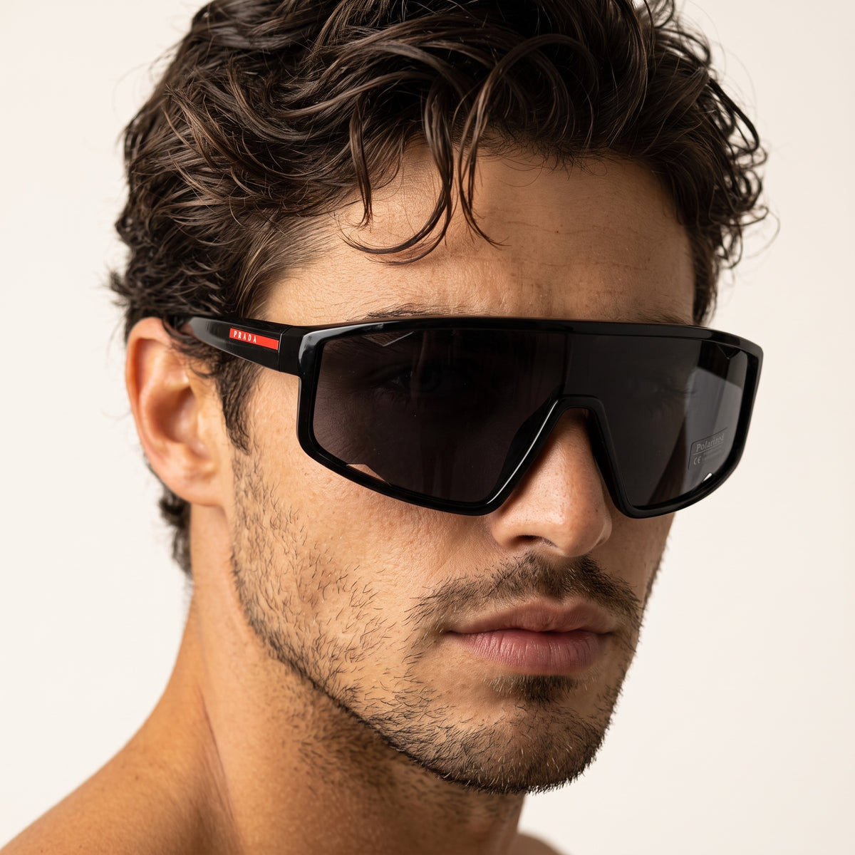 Prada oversized black shield sunglasses with red temple logo