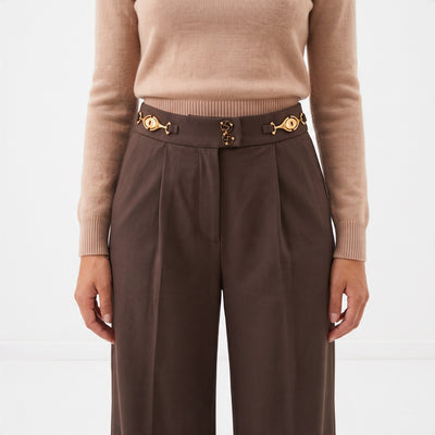 High-waist chocolate brown wide-leg trousers with gold hardware waistband