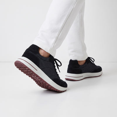 navy low-top sneakers with white midsole and maroon tread