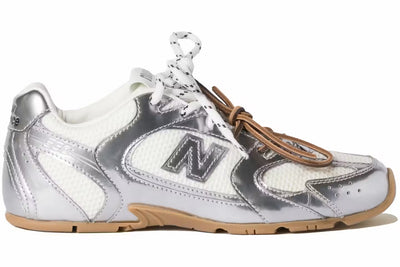New Balance 328 silver and white trainer with gum sole and mesh upper