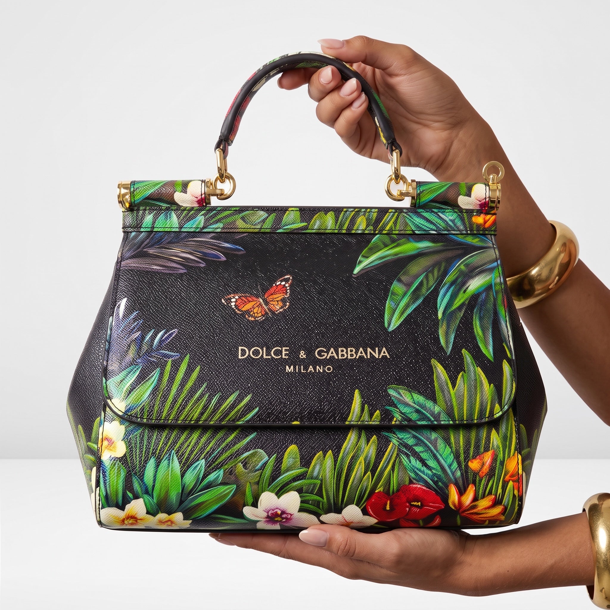 Dolce & Gabbana black Sicily top-handle bag with colourful tropical floral and butterfly print and gold hardware