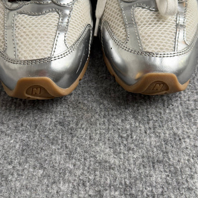 New Balance 328 silver and white trainer with gum sole and mesh upper