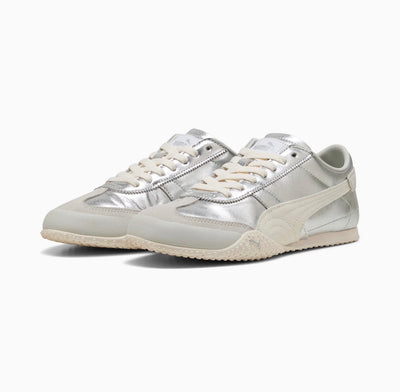 Puma low-profile silver metallic trainer with cream formstrip and textured off-white sole