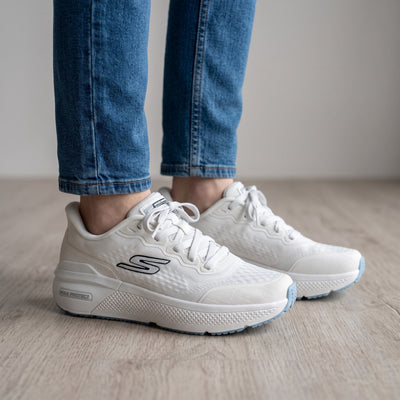 White Skechers Max Cushioning sneakers with thick sole and textured upper