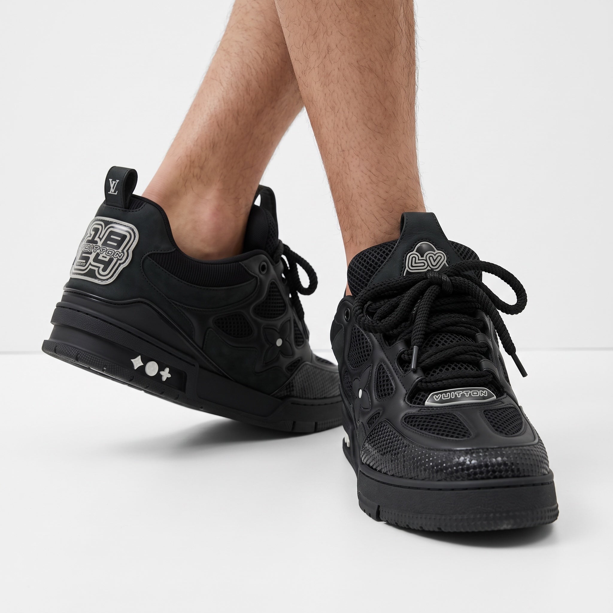 all-black Louis Vuitton chunky trainer with LV logo on heel and tongue