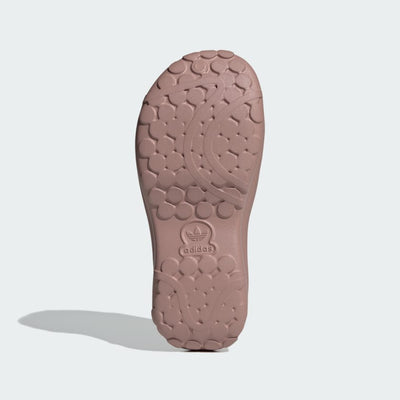 blush pink Adidas platform slide with embossed trefoil logo