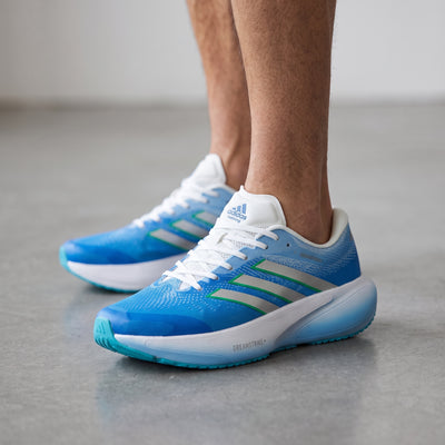 blue adidas running shoes with white midsole and aqua outsole