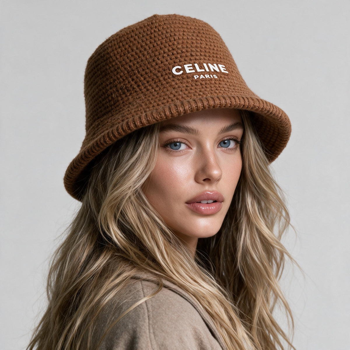 Brown waffle knit bucket hat with white CELINE PARIS logo