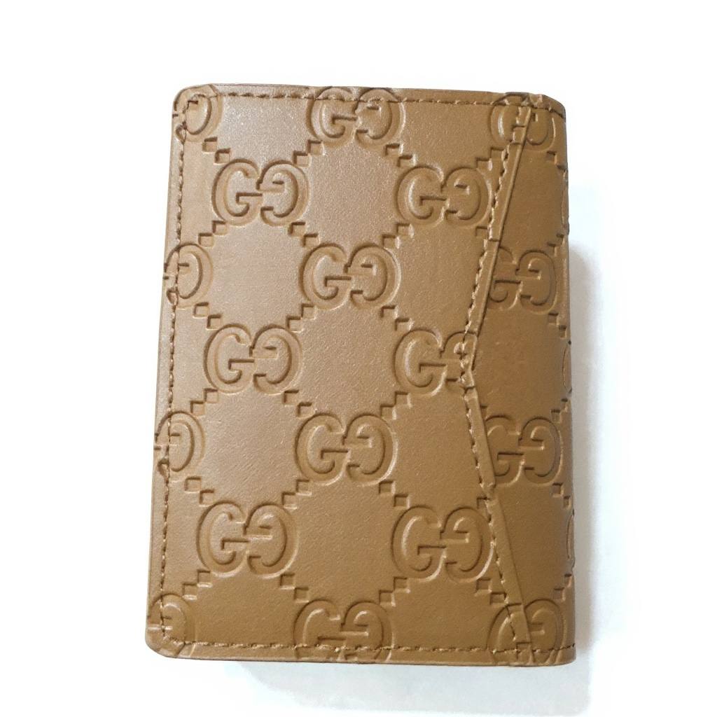 Gucci GG Embossed Leather Wallet — Brown - MASTERPIECE