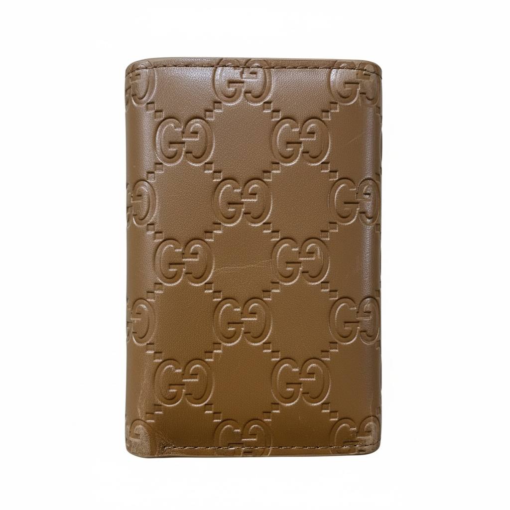 Gucci GG Embossed Leather Wallet — Brown - MASTERPIECE