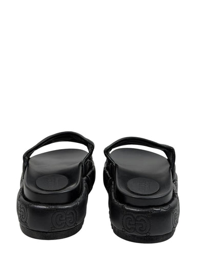 GUCCI GG Embossed Slide Sandals – Black Edition 🖤✨ - MASTERPIECE