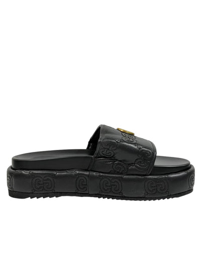 GUCCI GG Embossed Slide Sandals – Black Edition 🖤✨ - MASTERPIECE
