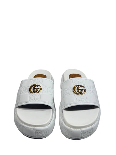 GUCCI GG Embossed Slide Sandals – White Edition 🤍✨ - MASTERPIECE