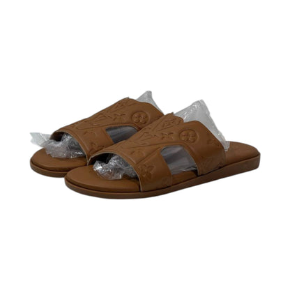 🤎 Louis Vuitton Monogram Embossed Waterfront Slides – Signature Luxury Edition - MASTERPIECE