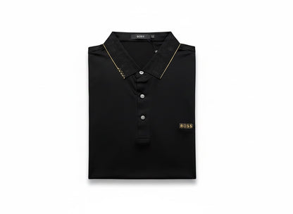 MASTERPIECE BOSS black polo shirt with gold BOSS logo on chest and gold detailing on collar. Smooth breathable fabric, tailored fit.