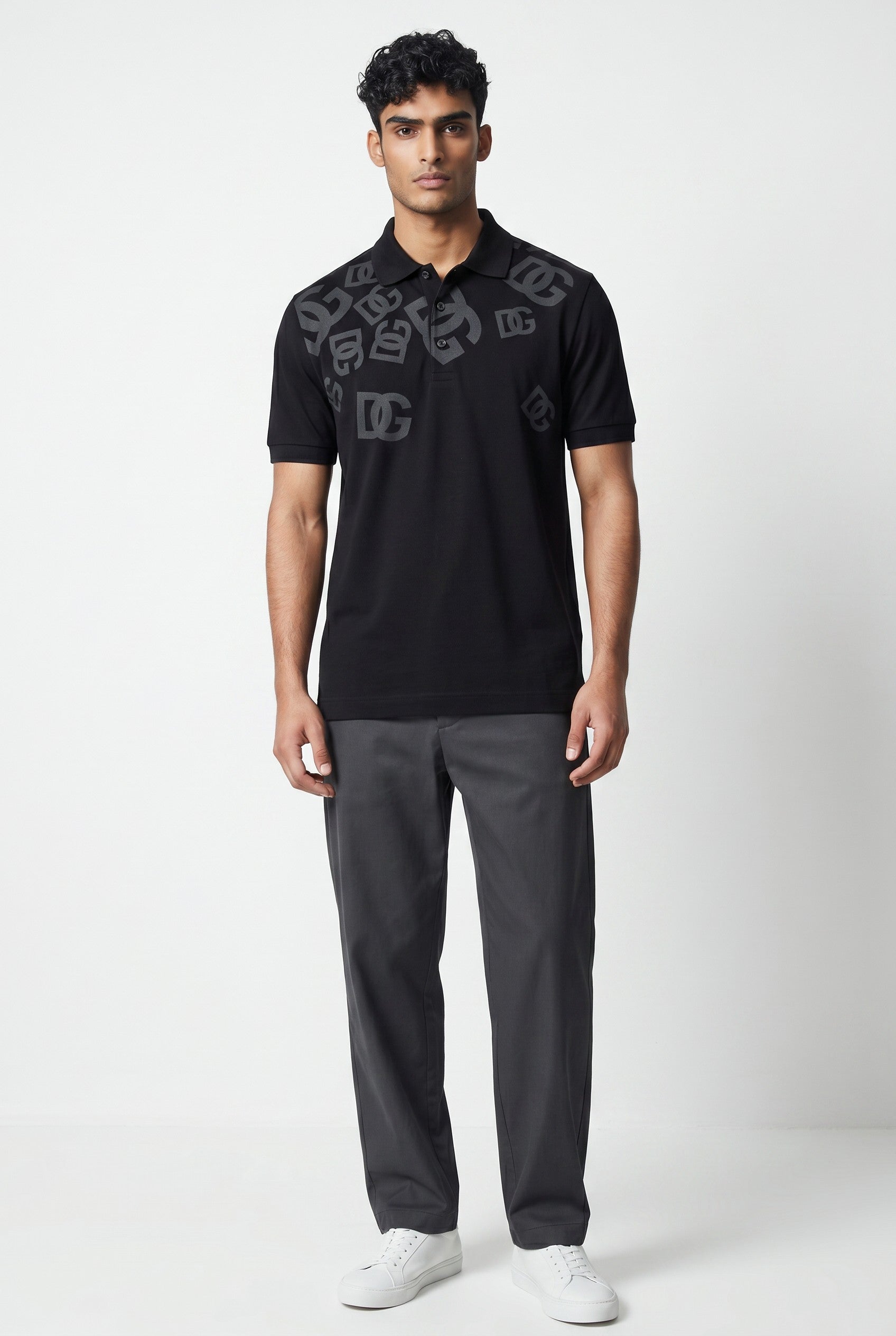 MASTERPIECE black short-sleeve polo shirt with all-over subtle DG monogram print and classic collar.