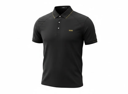 MASTERPIECE black polo shirt with gold BOSS logo on chest and gold trim on collar. Tailored fit, premium breathable fabric.