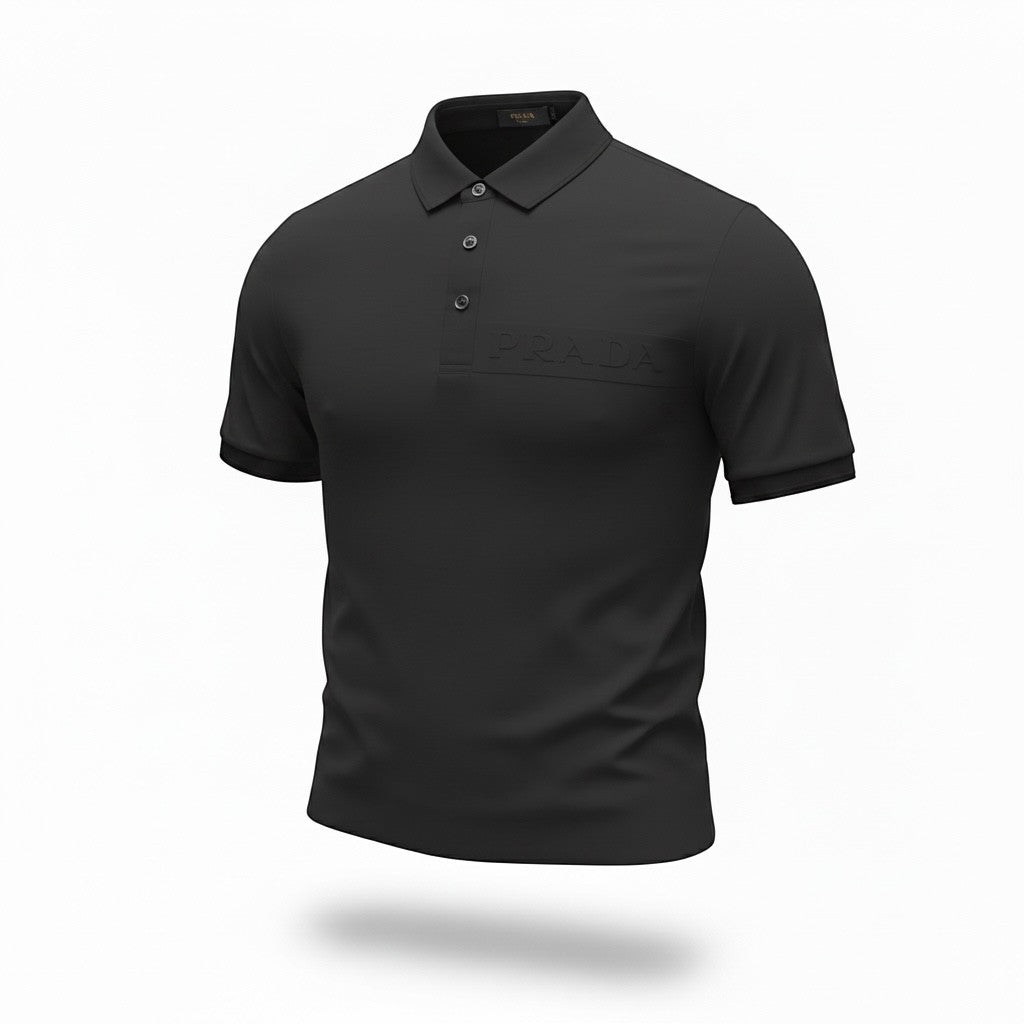 MASTERPIECE black stretch fabric polo shirt with tonal embossed Prada logo on chest and classic collar.