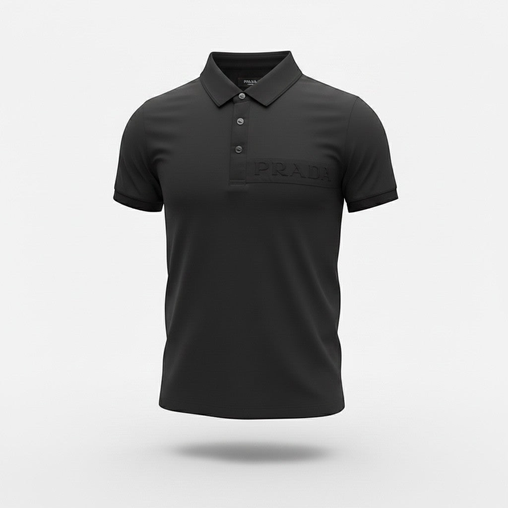 MASTERPIECE black stretch fabric polo shirt with tonal embossed Prada logo on chest, classic collar, and button placket.