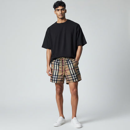 MASTERPIECE men's beige swim shorts with iconic Burberry check pattern, drawstring waist, and classic cut.