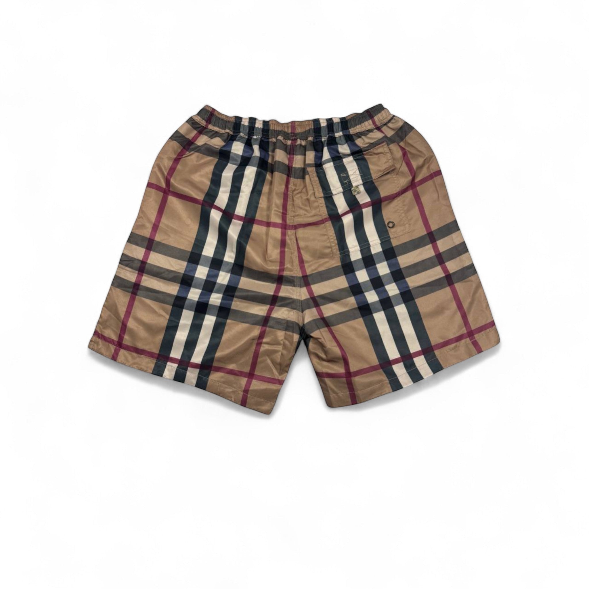 MASTERPIECE beige, blue, and red checkered swim shorts with elastic waistband and drawstring. Classic cut, lightweight fabric.