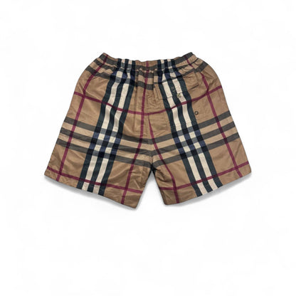 MASTERPIECE beige, blue, and red checkered swim shorts with elastic waistband and drawstring. Classic cut, lightweight fabric.