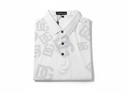 MASTERPIECE Dolce & Gabbana white polo shirt with all-over subtle grey DG monogram print. Classic collar, button placket, short sleeves.
