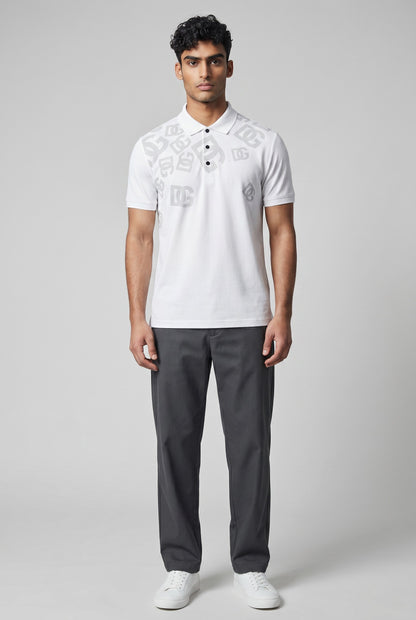 MASTERPIECE Dolce & Gabbana white polo shirt with all-over subtle DG monogram print and black buttons.