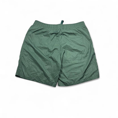 MASTERPIECE green technical fabric swim shorts with tonal monogram pattern and elastic waistband.