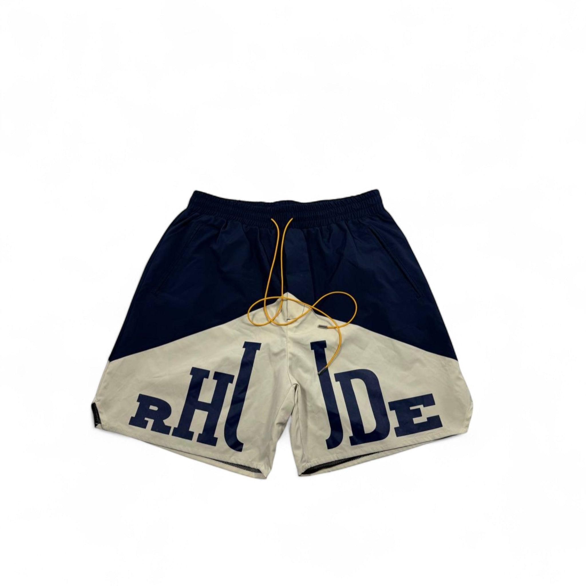 MASTERPIECE navy and cream panel logo swim shorts with yellow drawstring. Lightweight, fast-drying summer essential.