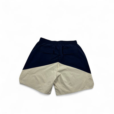 MASTERPIECE navy and cream panel logo swim shorts with two back pockets and iconic yellow drawstring.