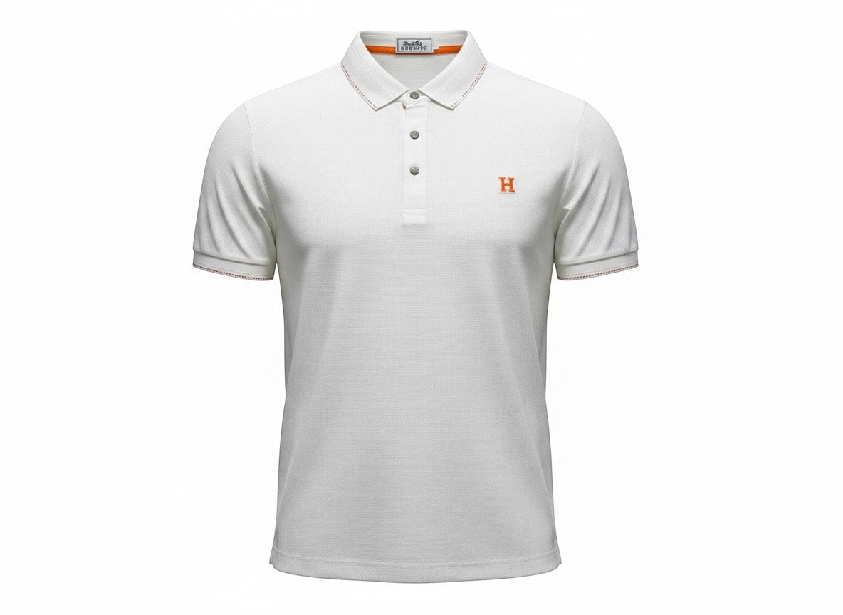 MASTERPIECE white textured polo shirt with orange embroidered H logo and contrast stitching on collar and cuffs.
