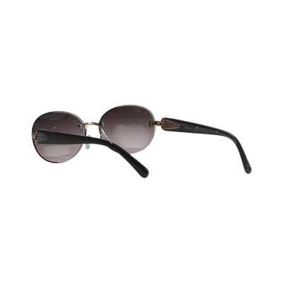 Miu Miu Oval Sunglasses – Black Gold Elegance 🖤✨ - MASTERPIECE