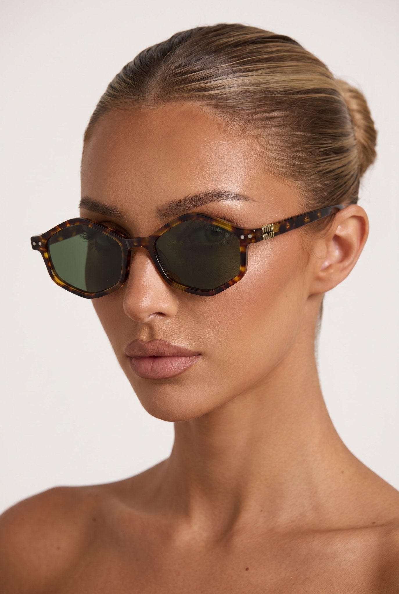Miu Miu Sunglasses – Tortoise Shell Frame 🕶️ - MASTERPIECE