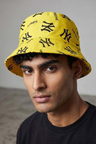 NY x Supreme Yellow Bucket Hat – Bold Monogram Streetwear Icon 💛🔥 - MASTERPIECE