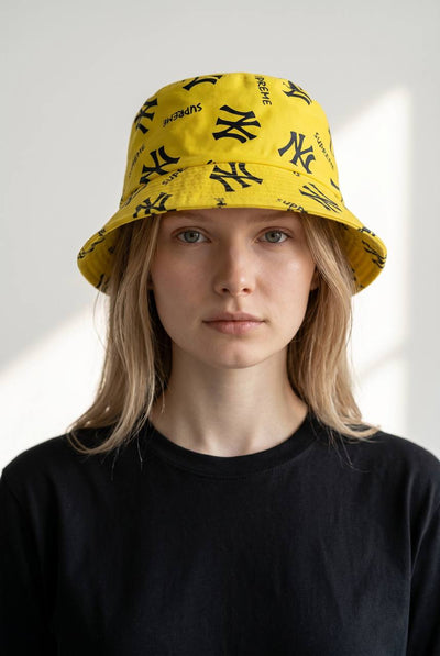 NY x Supreme Yellow Bucket Hat – Bold Monogram Streetwear Icon 💛🔥 - MASTERPIECE