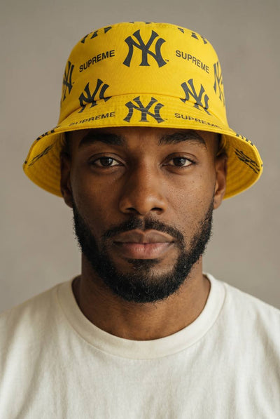 NY x Supreme Yellow Bucket Hat – Bold Monogram Streetwear Icon 💛🔥 - MASTERPIECE